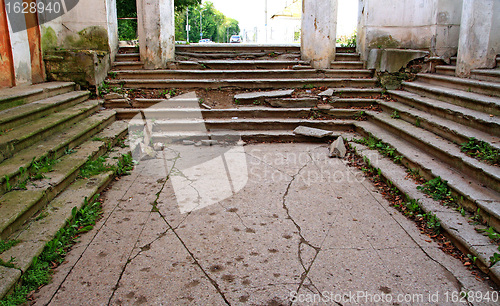 Image of aging stairway in destroyed building 