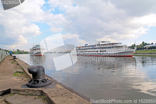 Image of three motor ships on quay