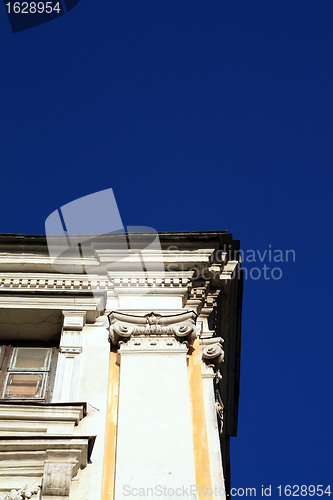 Image of ancient brick building on blue background