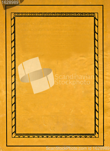 Image of decorative frame on old yellow paper