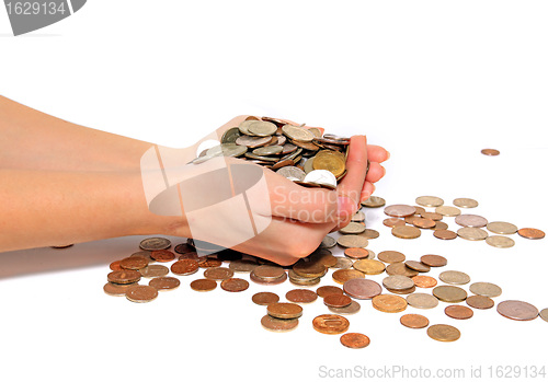 Image of coins in hand on white background