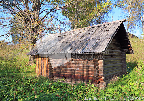 Image of old rural house amongst tree