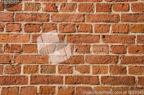 Image of Wall built of clay brick architectural fragment. 