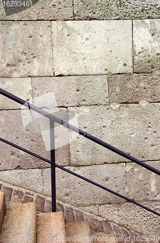 Image of Architectural fragment. Stairs and wall of concrete blocks. 