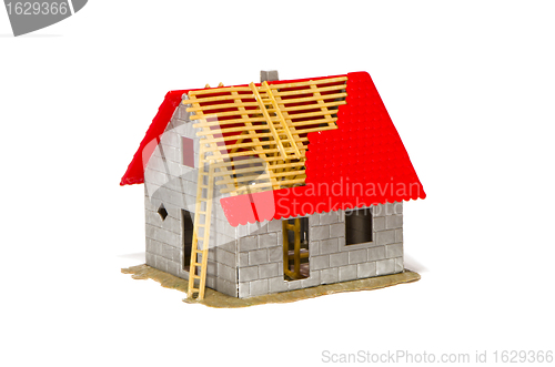 Image of Plastic house model details on white background. 