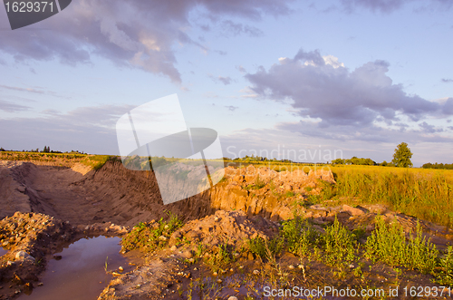 Image of Agricultural reclamation ditch dug in fields. 