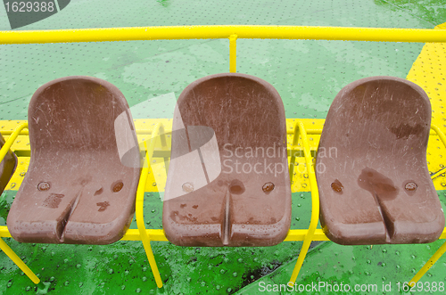 Image of Brown plastic seats of ferry. Passenger nautical transportation. 