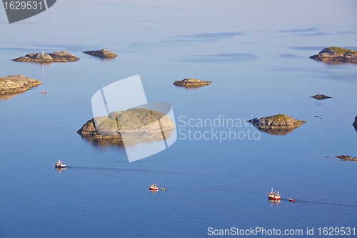 Image of Fishing boats and tiny islands