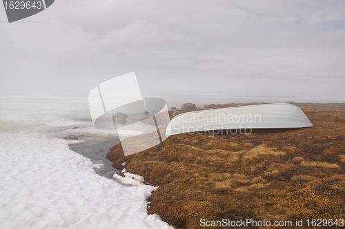 Image of White boat in fog