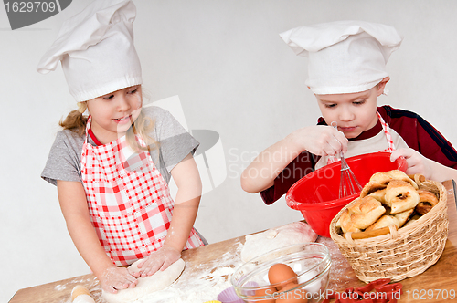 Image of two children cooks