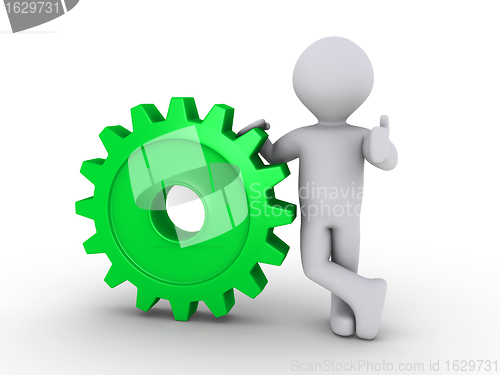 Image of Happy person holding cogwheel