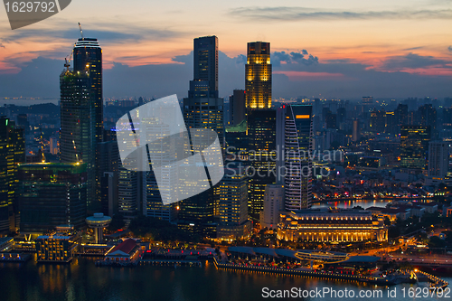 Image of Sunset Over Singapore City Skyline