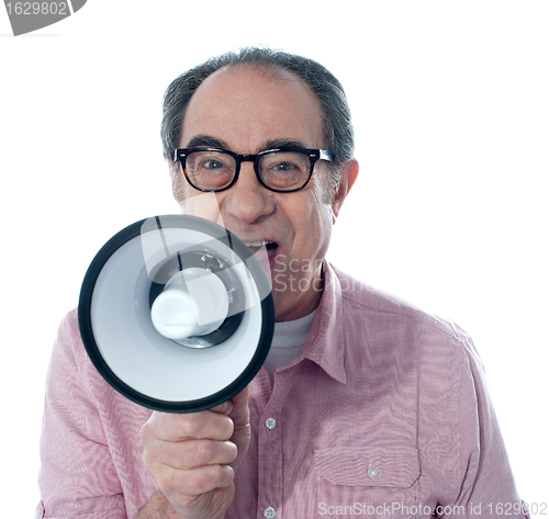 Image of Excited old man making an announcement