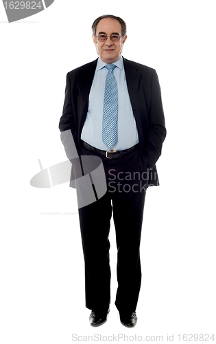 Image of Full-length view of a company manager