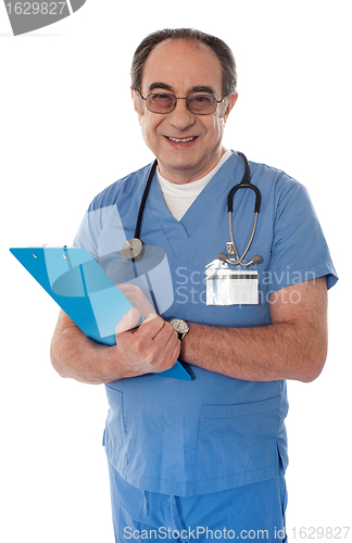 Image of Experienced doctor smiling at camera