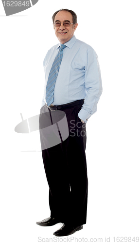 Image of Side view of a stylish senior executive