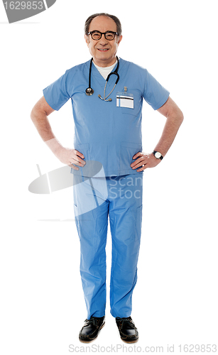 Image of Full length view of smiling experienced medical professional