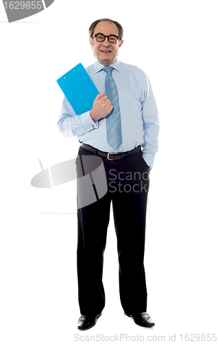 Image of Corporate businessman holding document