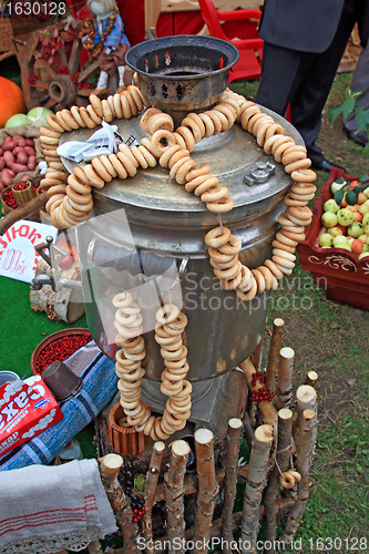 Image of old samovar on rural market