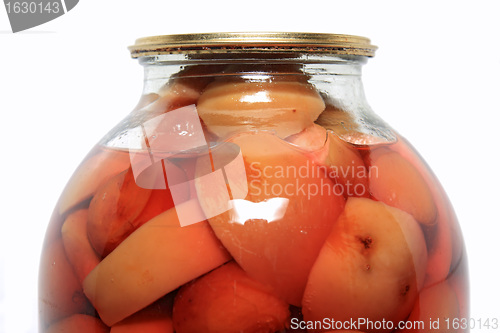 Image of canned apple in glass jar