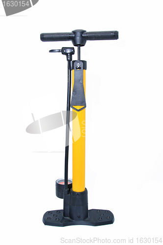 Image of yellow pump on white background