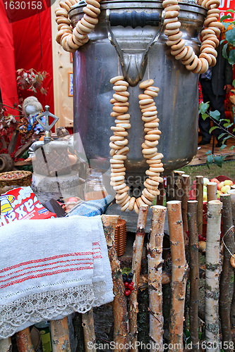 Image of old samovar on rural market