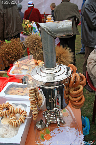 Image of old samovar on rural market