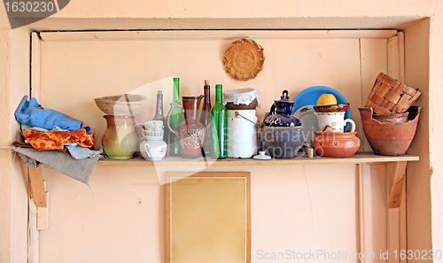 Image of wooden shelf in artist studio