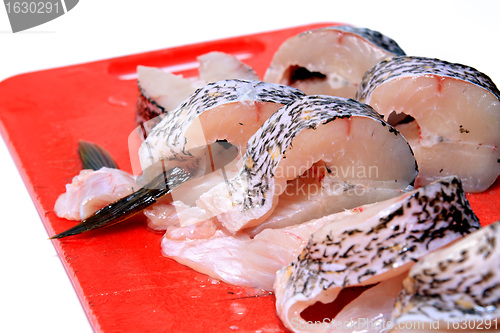 Image of cut fish on white background