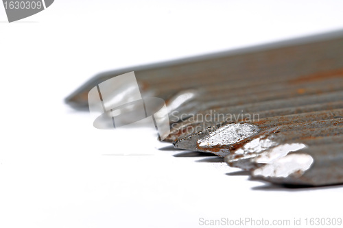 Image of old nail on white background