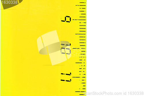 Image of aging yellow straightedge on white background