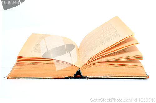 Image of openning aging book on white background