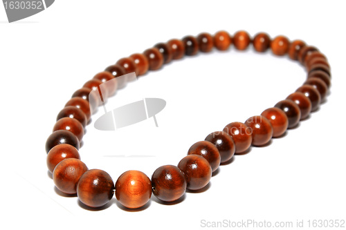 Image of wooden necklace on white background