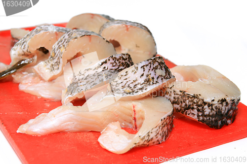 Image of cut fish on white background