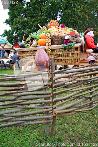 Image of fruits and vegetables in cart on rural market