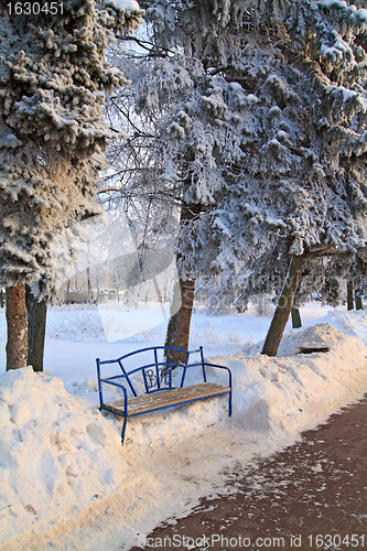 Image of iron bench in town park