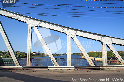 Image of town bridge through small river