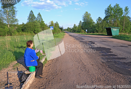 Image of bus stop on rural road