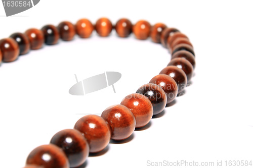 Image of wooden necklace on white background