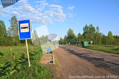 Image of bus stop on rural road