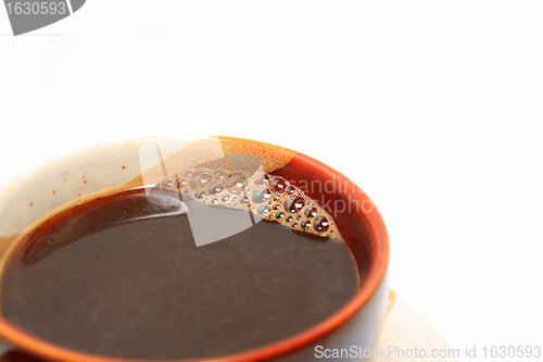 Image of coffee in cup on white background