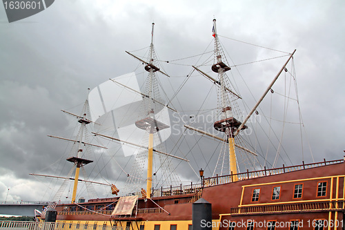 Image of old-time schooner on town quay