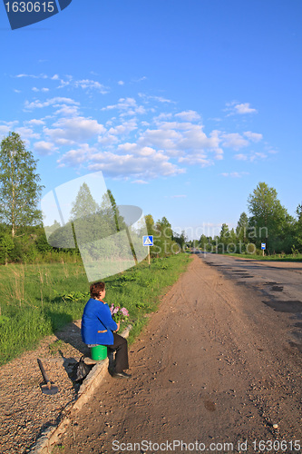 Image of bus stop on rural road