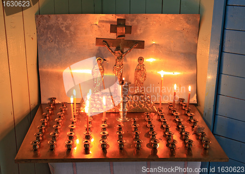 Image of candles in rural orthodox church 