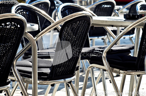 Image of chairs on  the sunshine day