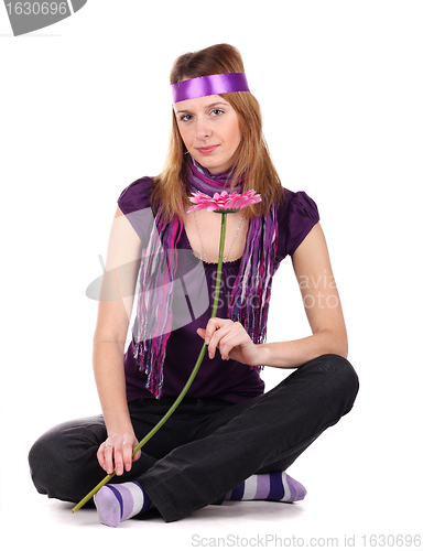 Image of Girl with a flower sitting