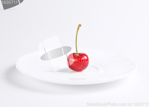 Image of Red cherry at the plate