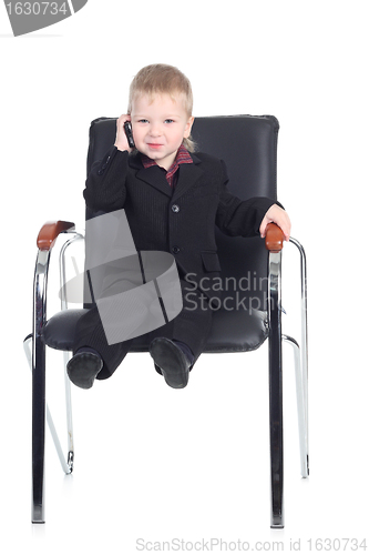 Image of Little businessman with a phone