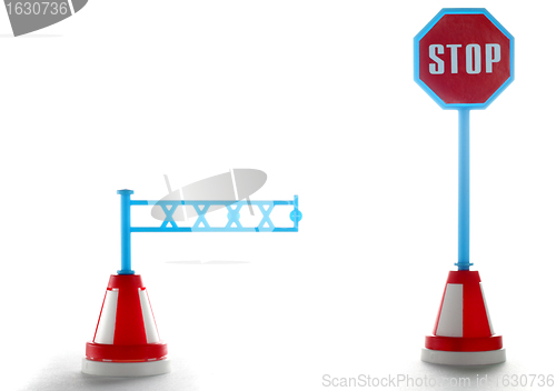 Image of Barrier with stop road sign