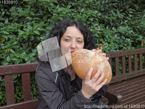 Image of Girl eating bread